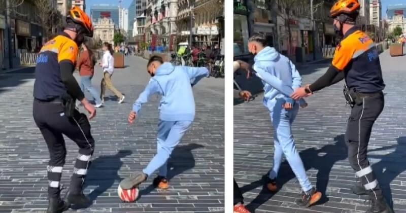 Au centre-ville de Bruxelles, un policier et un jeune s'amusent en jouant au foot