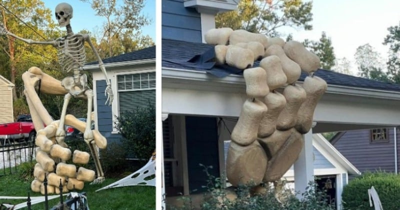 Cette décoration d'Halloween impressionnante représente un squelette gigantesque qui semble sortir d'une maison