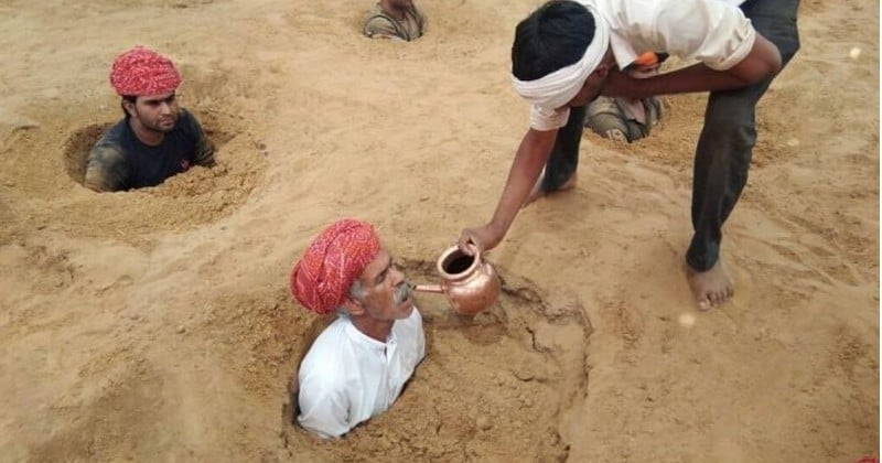 Menacés d'expropriation, des paysans indiens décident de s'enterrer