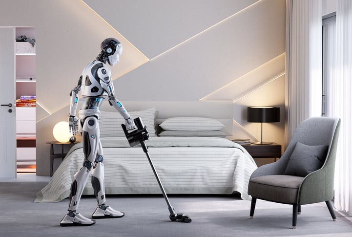 Un robot humano&iuml;de passe l'aspirateur