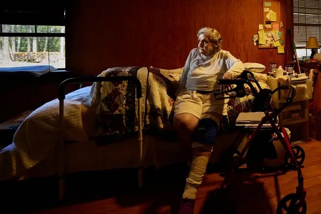 Patricia Willson assise sur son lit